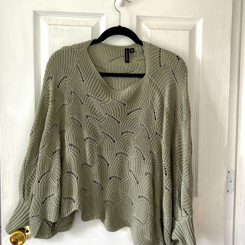 This green sweater is lose fitting and super comfy.